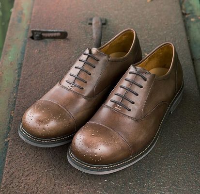 Black Round Toe Pria Casual Shoes Bernafas Bisnis Casual Sport Shoes
